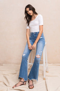 Mid-Rise Flare Jeans With Hem Detail - The Closet Factor